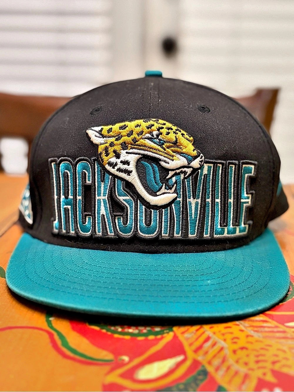 New Era Jacksonville Jaguars Throwback Crawl Standard 9FIFTY Snapback Hat 9FIFTY